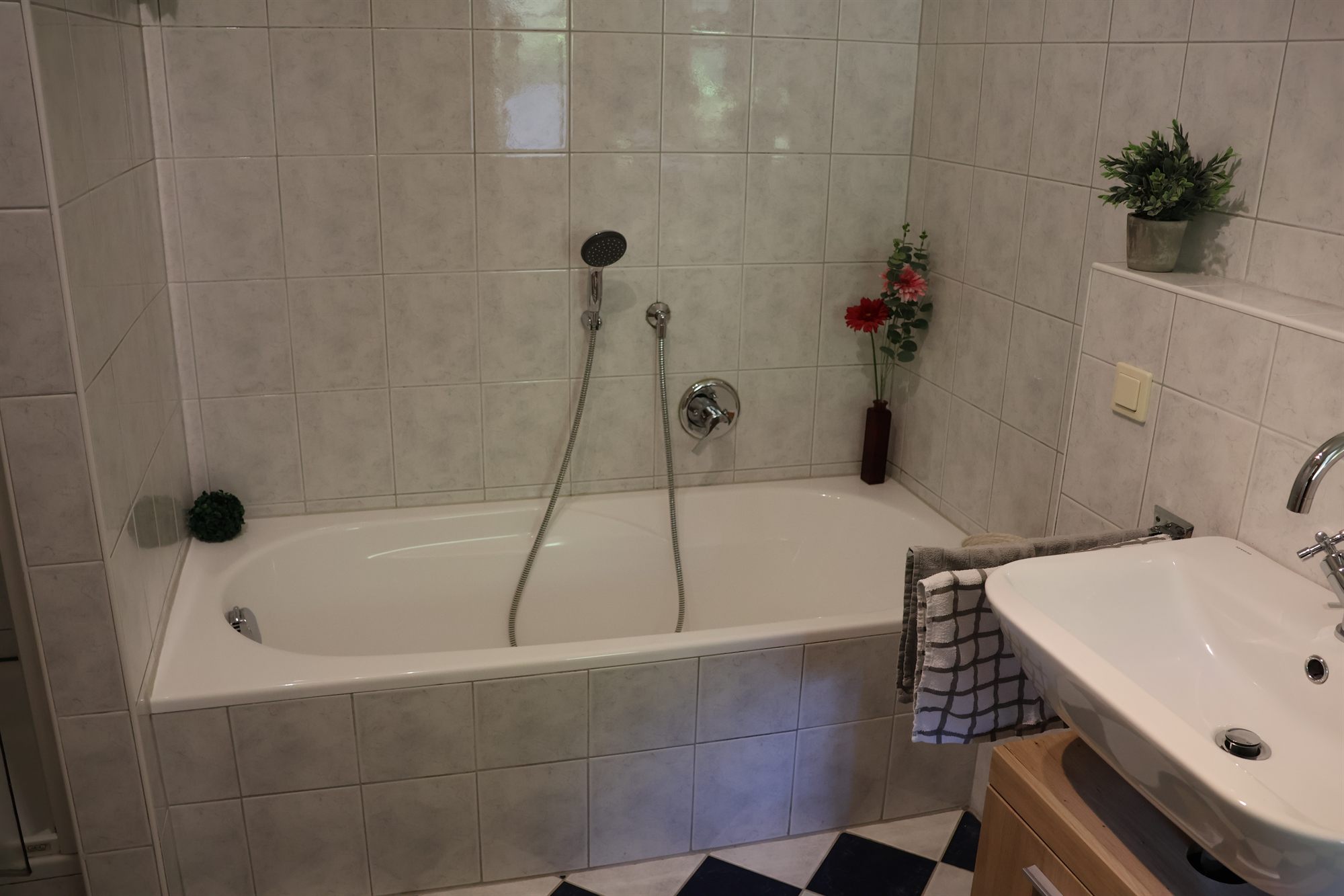 Badewanne mit Handbrause